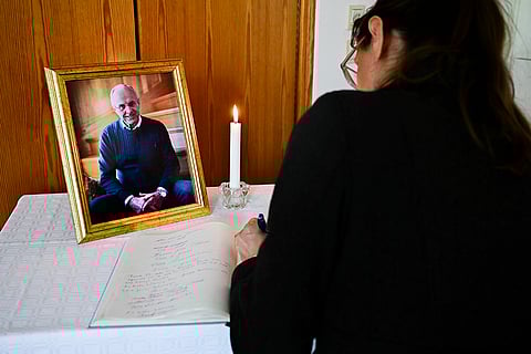 Sven-Goran Eriksson Funeral: A woman signs a condolence book for the late Swedish soccer coach